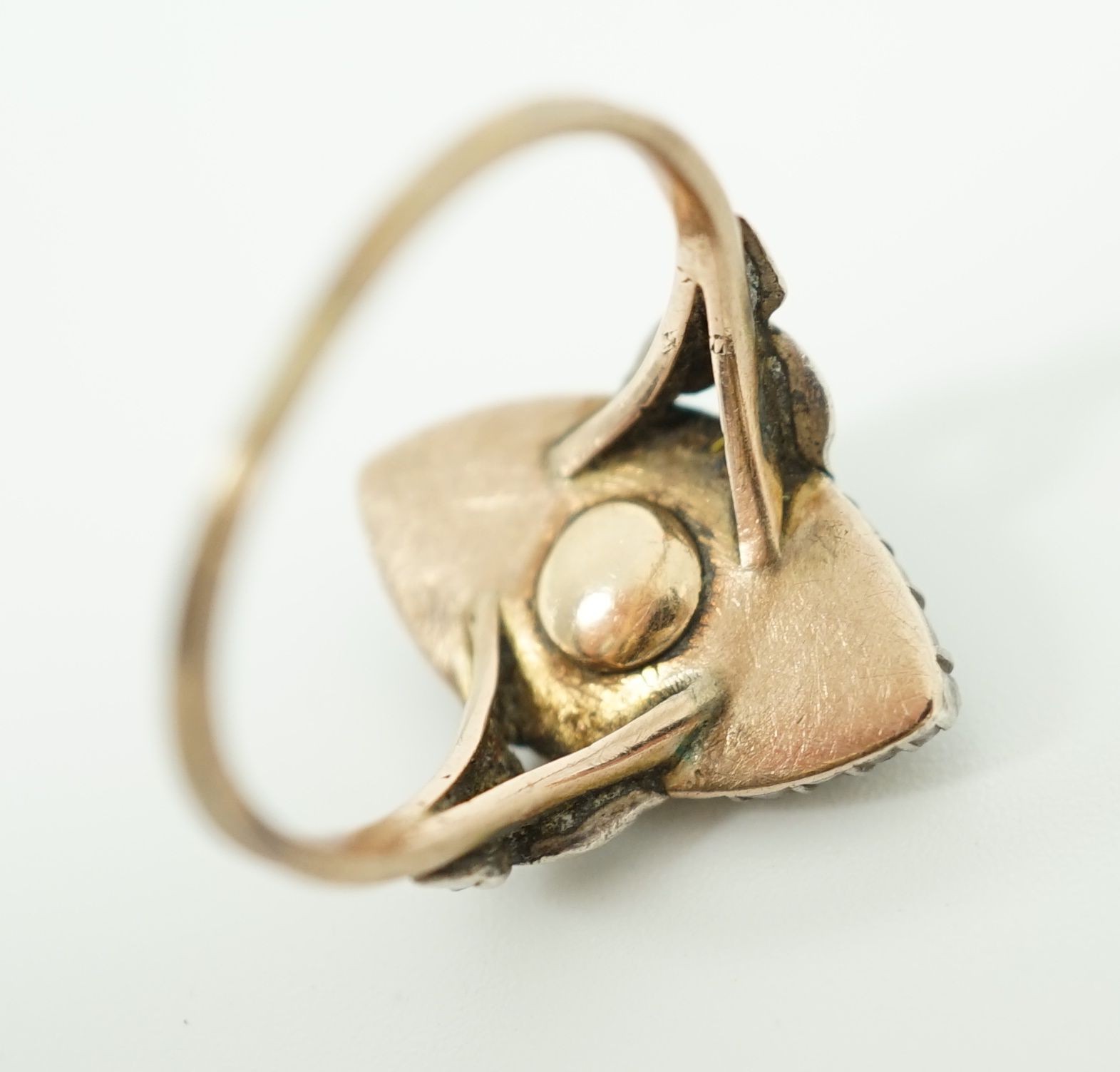 An 19th century gold, rose cut diamond and blue guilloche enamel set marquise shaped ring